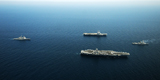 De gauche à droite : l'USS Normandy, l'USS Harry S. Truman, le Charles de Gaulle et le Cassard. (©United States Navy)